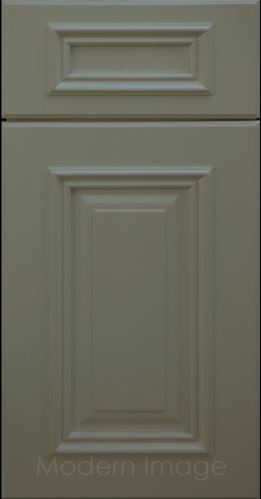 Hamilton cabinet door in Evergreen color with double raised panel and mitered elevated molding.